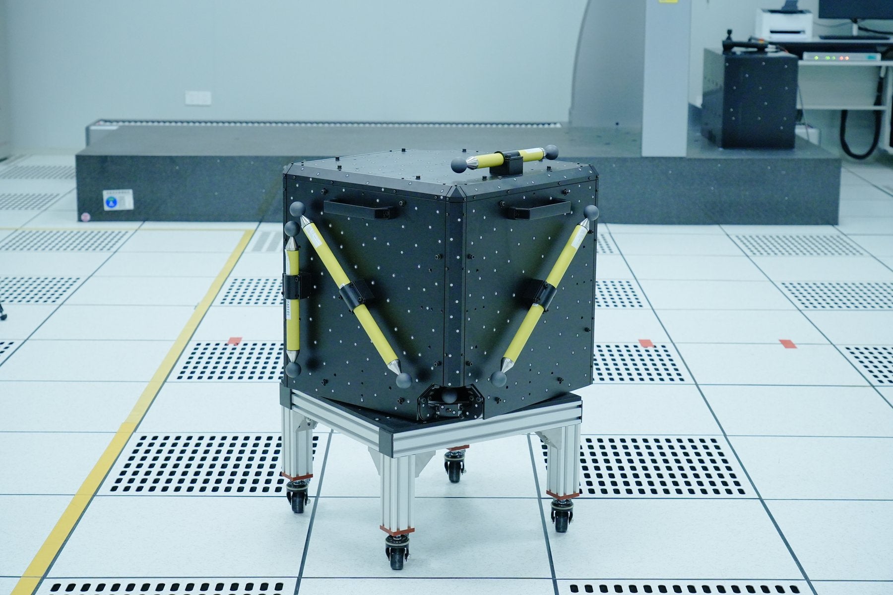 A calibration frame holding seven standard artefacts used to verify 3D scanner accuracy